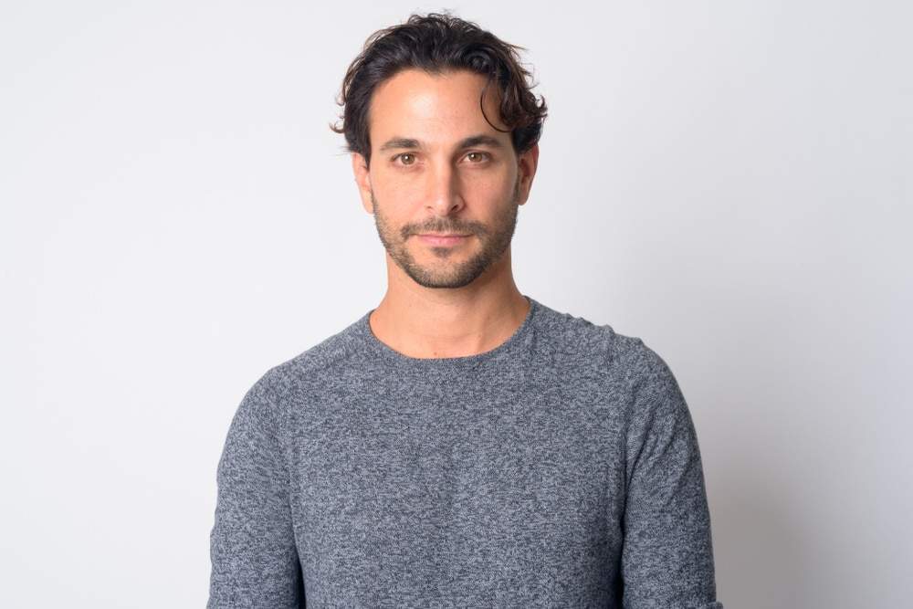 Face,Of,Handsome,Hispanic,Man,Looking,At,Camera