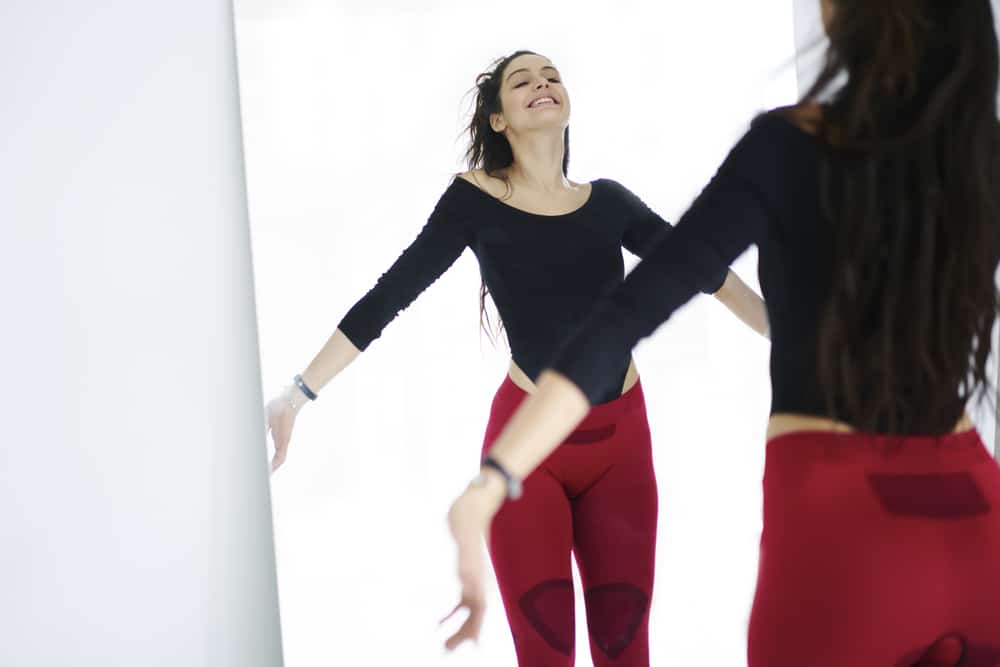 Cheerful,Young,Attractive,Female,Dressed,In,Sports,Outfit,Feeling,Excited